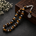 Premium Tiger Aqeeq Tasbih – Elegant Handmade Prayer Beads